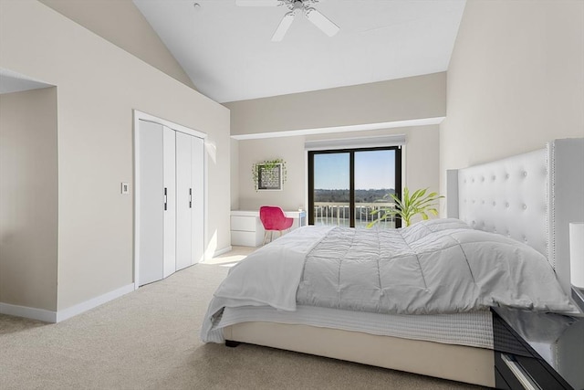 carpeted bedroom with high vaulted ceiling, a ceiling fan, a closet, baseboards, and access to exterior