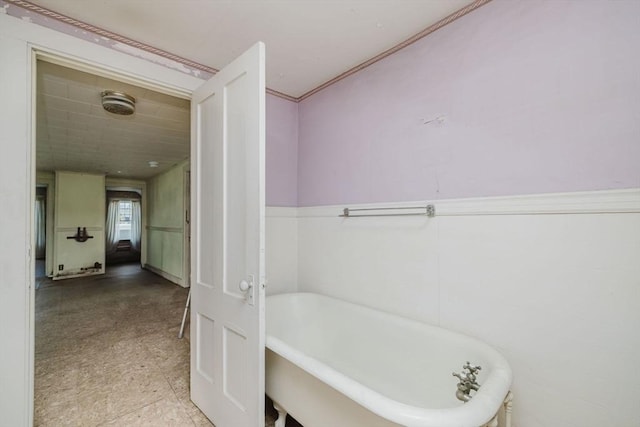 full bath with a freestanding tub