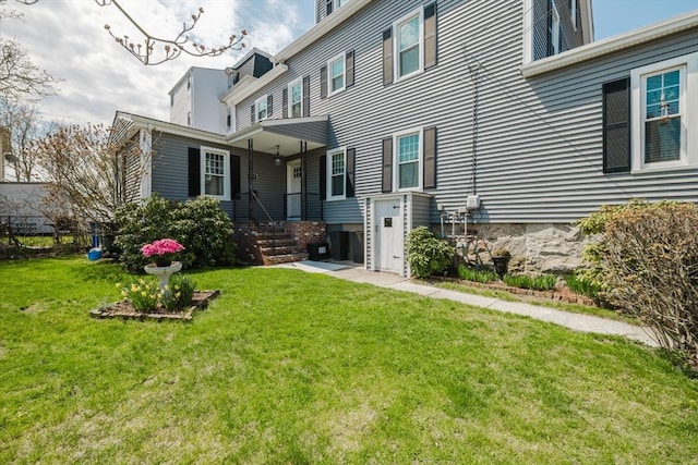 exterior space with a yard
