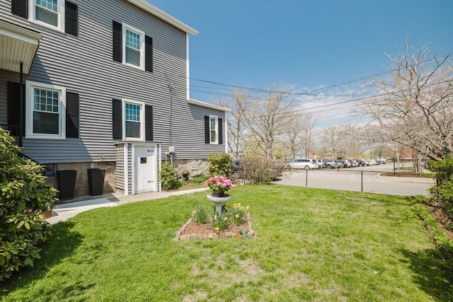 view of yard with fence