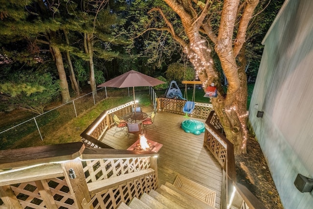 deck featuring an outdoor fire pit