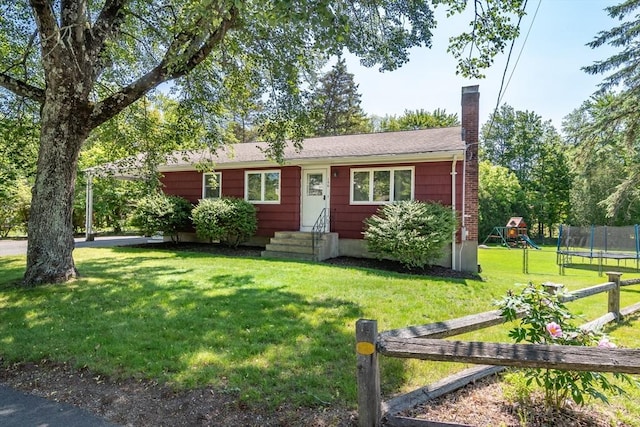 146 S Main St, Natick, MA 01760 - ranch-style home featuring a chimney, a trampoline, a playground, and entry steps