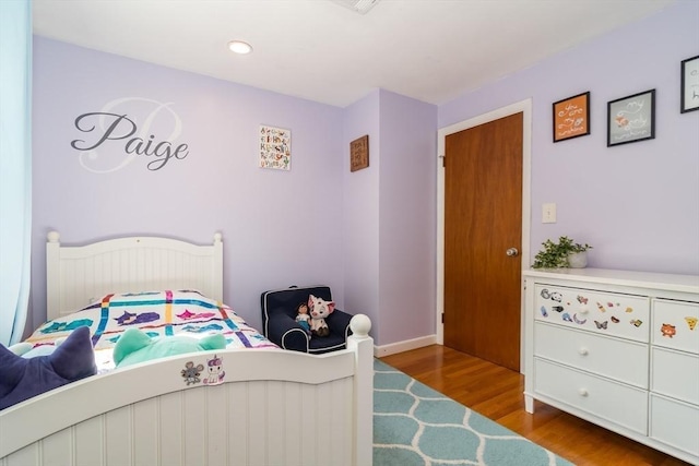 146 S Main St, Natick, MA 01760 - bedroom featuring wood finished floors, baseboards, and recessed lighting