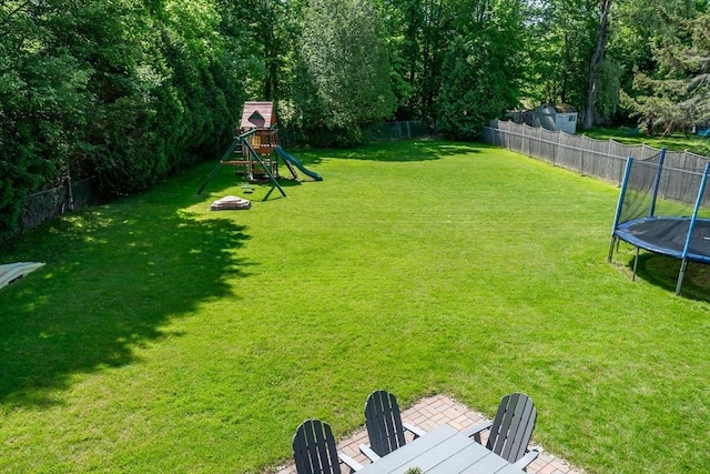 146 S Main St, Natick, MA 01760 - view of yard with a trampoline and a playground