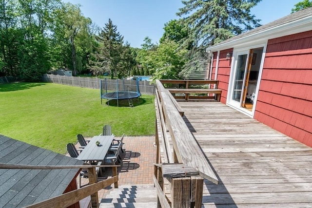 146 S Main St, Natick, MA 01760 - wooden terrace featuring a trampoline and outdoor dining area