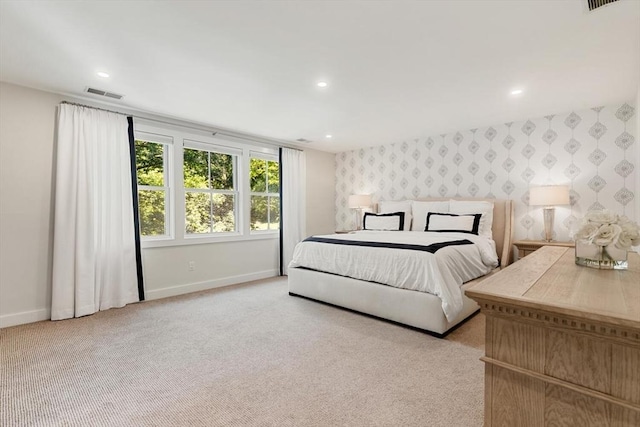 bedroom featuring visible vents, recessed lighting, carpet, wallpapered walls, and baseboards