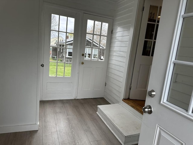 doorway with wood finished floors