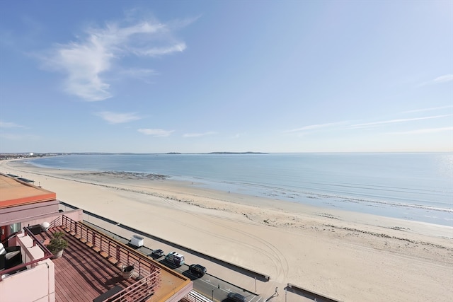 property view of water featuring a beach view