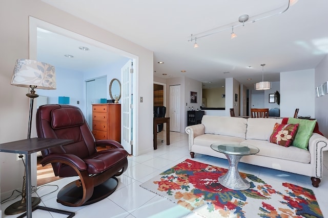 tiled living room with rail lighting