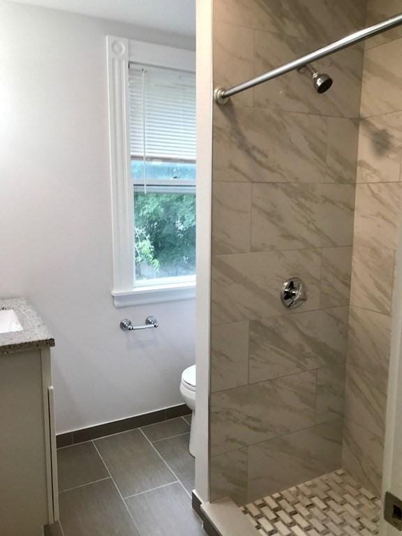 36-38 Coleman St, Boston, MA 02125 - full bath with a stall shower, vanity, and tile patterned floors