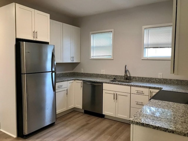 36-38 Coleman St, Boston, MA 02125 - kitchen featuring stainless steel appliances, plenty of natural light, and light wood-style floors