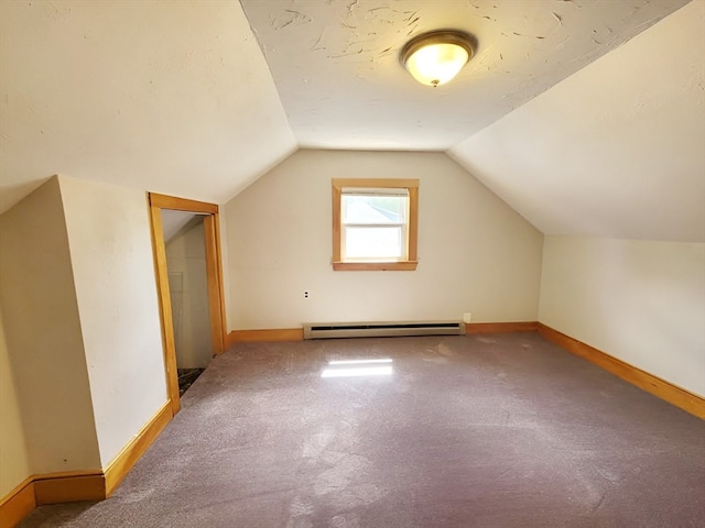 bonus room with lofted ceiling, a baseboard radiator, and carpet