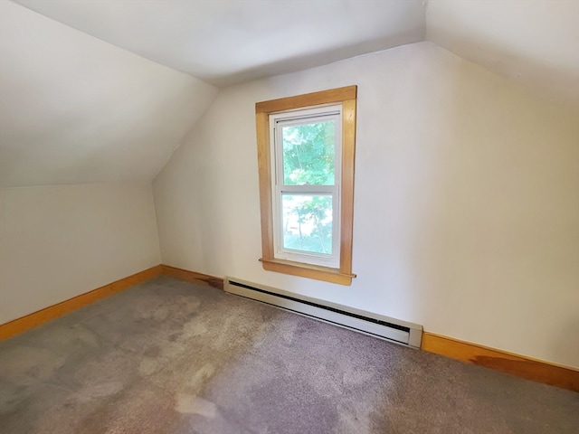 bonus room with lofted ceiling, a baseboard radiator, and carpet flooring