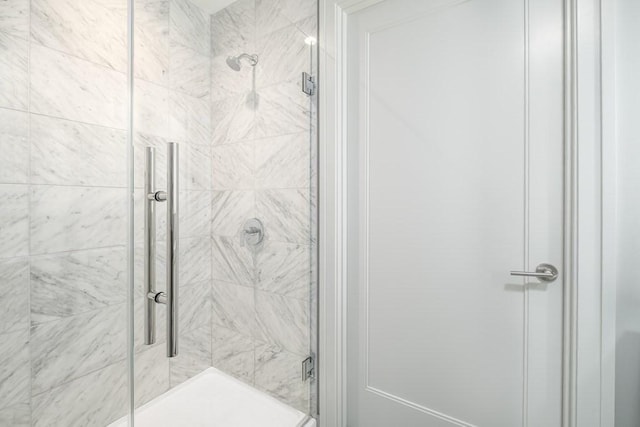 bathroom featuring a stall shower