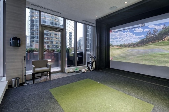 rec room featuring carpet flooring, floor to ceiling windows, a textured ceiling, and golf simulator