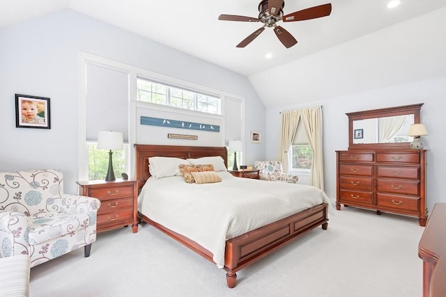 bedroom featuring vaulted ceiling, light carpet, recessed lighting, and a ceiling fan