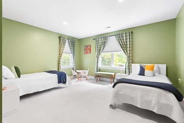 carpeted bedroom with recessed lighting and baseboards