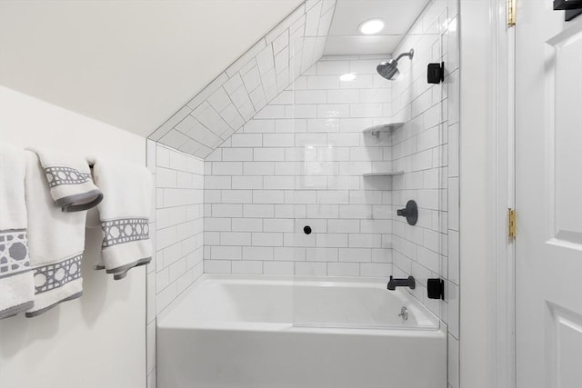 bathroom featuring recessed lighting and  shower combination