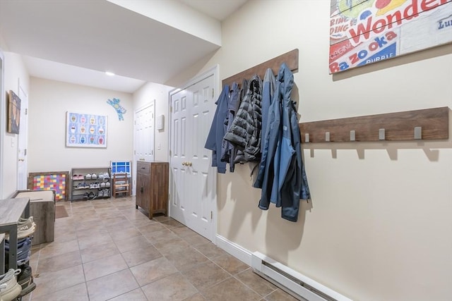 mudroom featuring a baseboard heating unit, recessed lighting, and tile patterned floors
