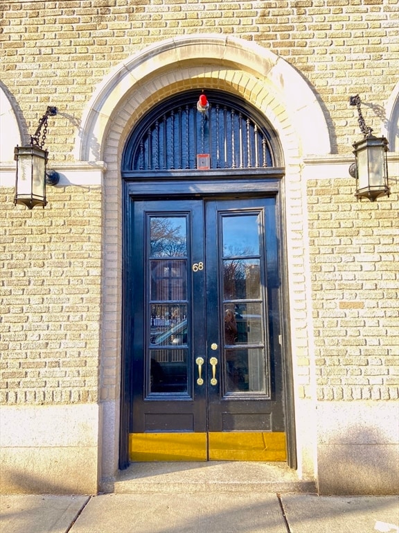 property entrance featuring french doors