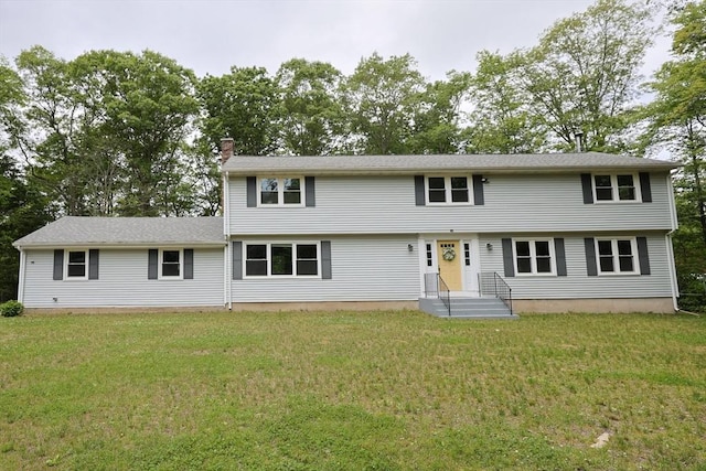 269 Fairview Ave, Rehoboth, MA 02769 - colonial house featuring a front yard and a chimney