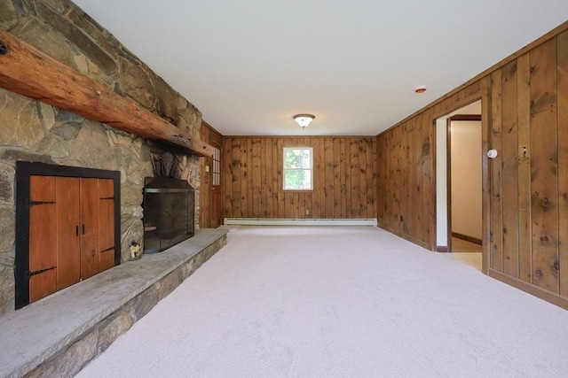 269 Fairview Ave, Rehoboth, MA 02769 - unfurnished living room with baseboard heating, carpet floors, wooden walls, and a fireplace