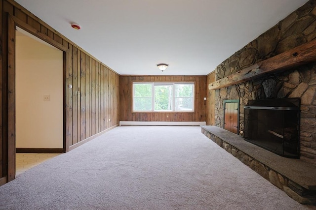 269 Fairview Ave, Rehoboth, MA 02769 - living area featuring a baseboard radiator, carpet floors, wood walls, and a fireplace
