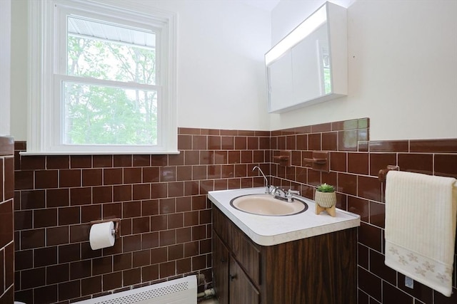 269 Fairview Ave, Rehoboth, MA 02769 - bathroom featuring vanity, tile walls, and wainscoting