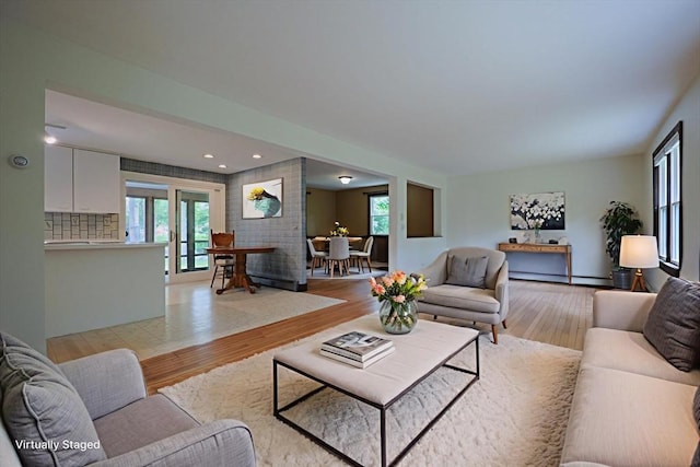 269 Fairview Ave, Rehoboth, MA 02769 - living room featuring light wood-type flooring, a baseboard radiator, and recessed lighting