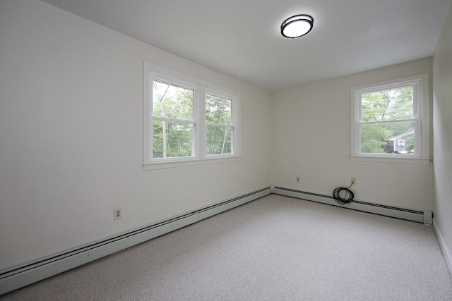 269 Fairview Ave, Rehoboth, MA 02769 - carpeted empty room featuring healthy amount of natural light and a baseboard heating unit