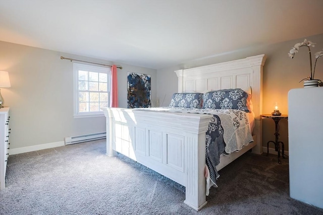 bedroom with dark carpet, baseboards, and a baseboard radiator