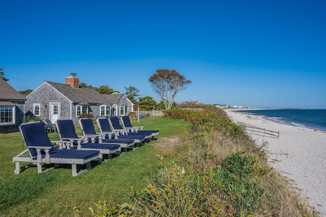 135 S Shore Dr Unit 17, Yarmouth, MA 02664 - view of grassy yard with view of water and beach