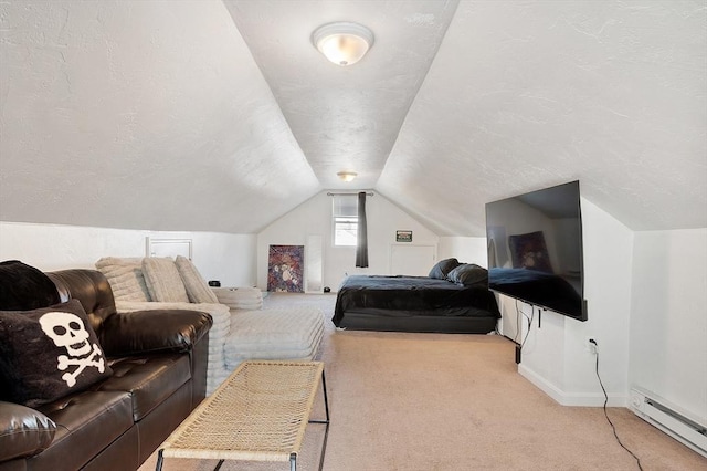 33 Alden Ave, Revere, MA 02151 - carpeted bedroom with a baseboard radiator, vaulted ceiling, baseboards, and a textured ceiling