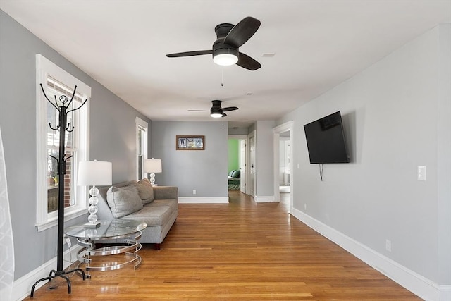 33 Alden Ave, Revere, MA 02151 - living area with ceiling fan, light wood-style floors, baseboards, and healthy amount of natural light