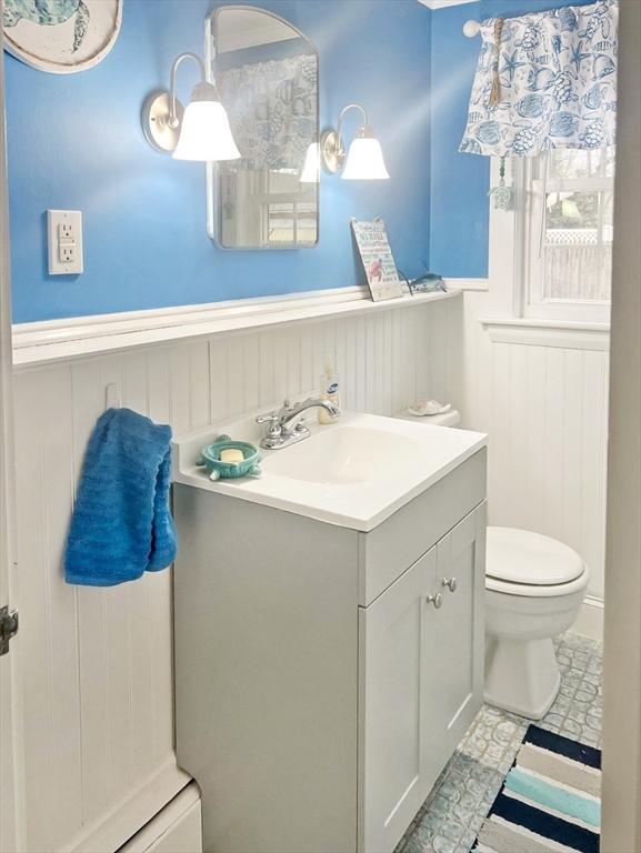 16 Samoset Rd, Yarmouth, MA 02664 - bathroom featuring vanity, wainscoting, and toilet