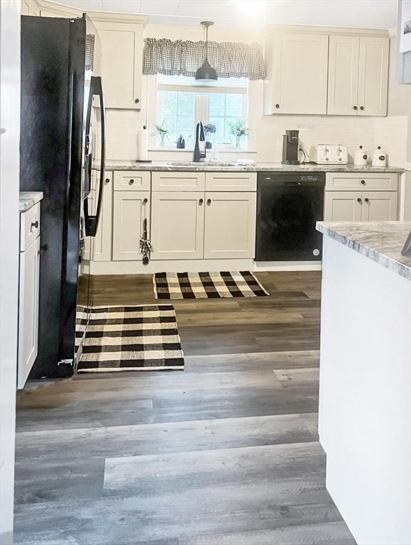 16 Samoset Rd, Yarmouth, MA 02664 - kitchen featuring a sink, dark wood-style flooring, black appliances, white cabinetry, and pendant lighting
