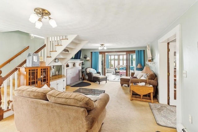 650 Pearse Rd, Swansea, MA 02777 - carpeted living room featuring stairs and baseboard heating