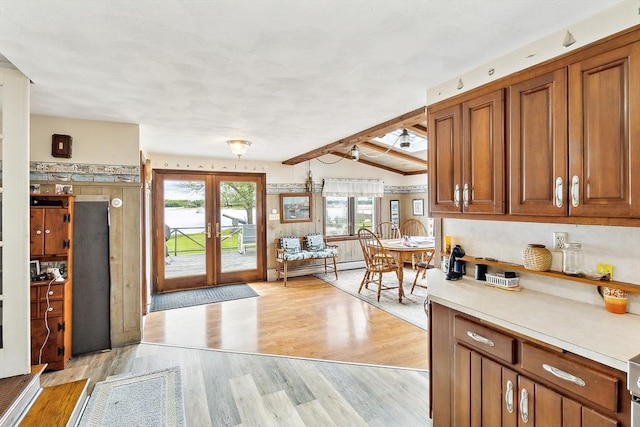 650 Pearse Rd, Swansea, MA 02777 - entrance foyer with light wood-type flooring, french doors, and baseboard heating