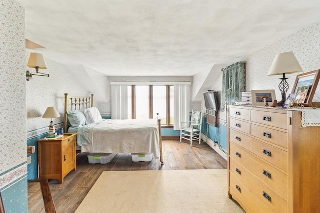 650 Pearse Rd, Swansea, MA 02777 - bedroom featuring wallpapered walls and wood finished floors