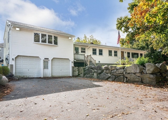 view of front of property with a garage