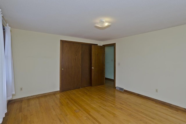 51 Hardy St, Springfield, MA 01129 - unfurnished bedroom featuring light wood finished floors, a closet, and baseboards