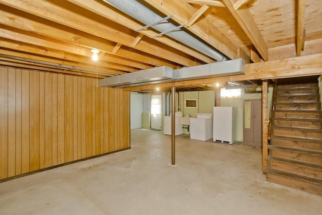 51 Hardy St, Springfield, MA 01129 - below grade area with stairs, independent washer and dryer, wood walls, and freestanding refrigerator