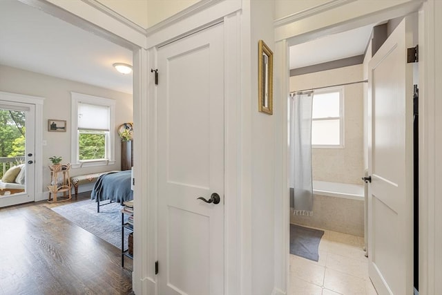 hallway with light wood-style flooring
