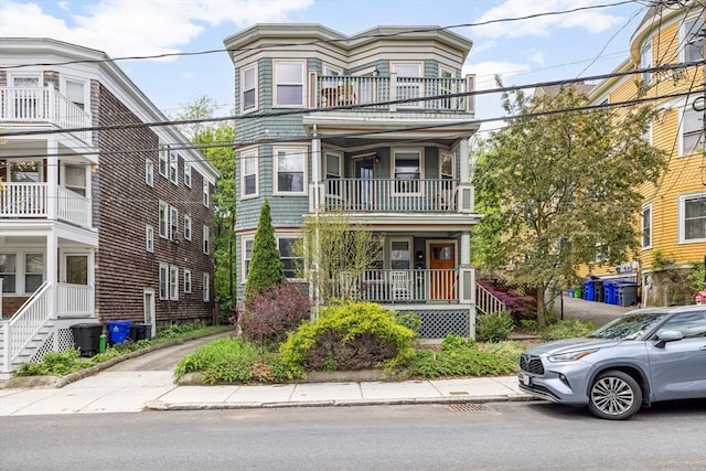 townhome / multi-family property with a balcony