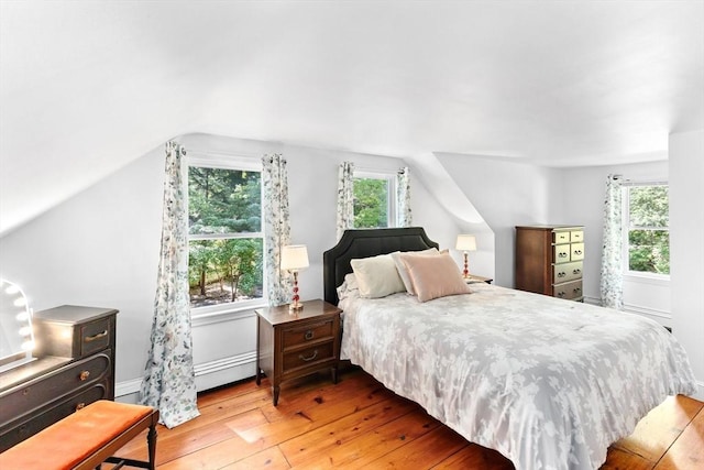 16 Summer St, Easton, MA 02356 - bedroom featuring hardwood / wood-style floors, lofted ceiling, a baseboard radiator, and baseboards