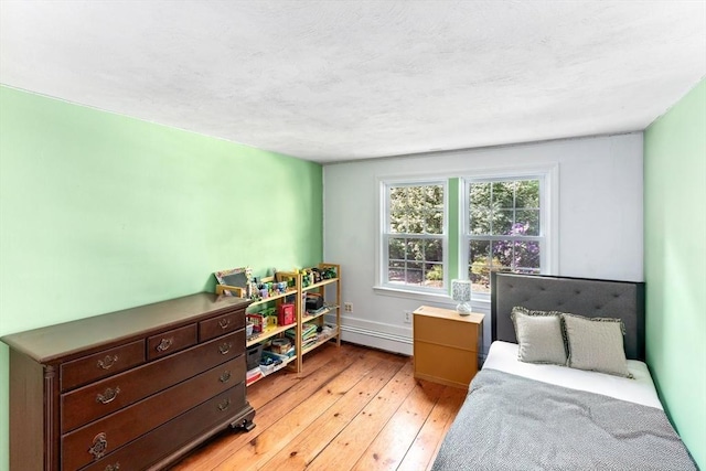 16 Summer St, Easton, MA 02356 - bedroom featuring a baseboard radiator and light wood-type flooring