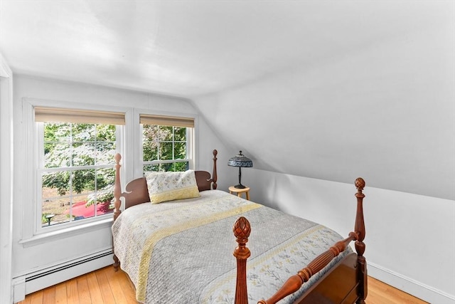 16 Summer St, Easton, MA 02356 - bedroom featuring baseboard heating, lofted ceiling, and light wood-type flooring