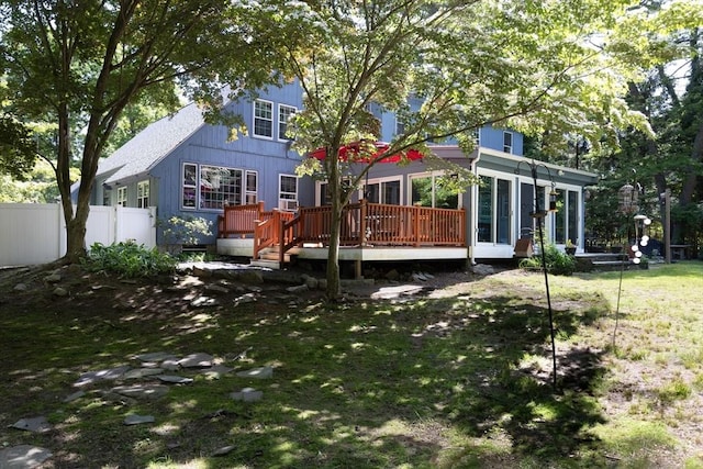 16 Summer St, Easton, MA 02356 - rear view of house with a sunroom and a deck