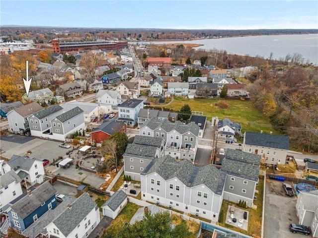 drone / aerial view with a water view