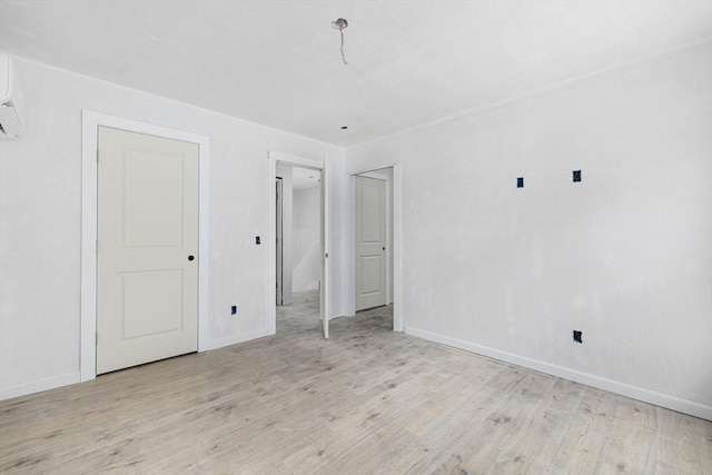 unfurnished bedroom featuring light hardwood / wood-style floors